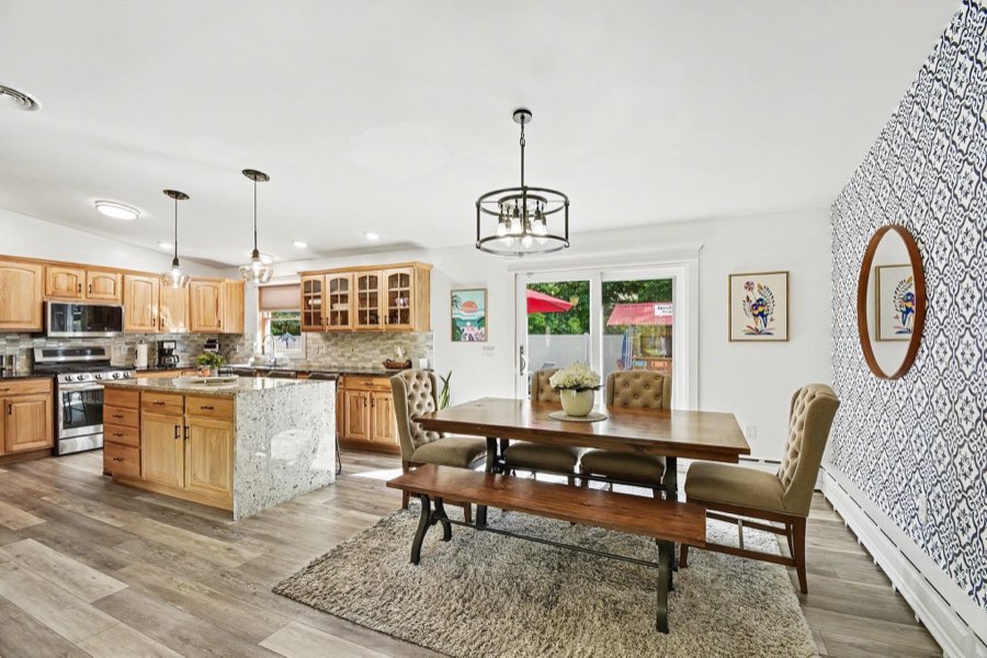 Dining area positioned beside the renovated kitchen