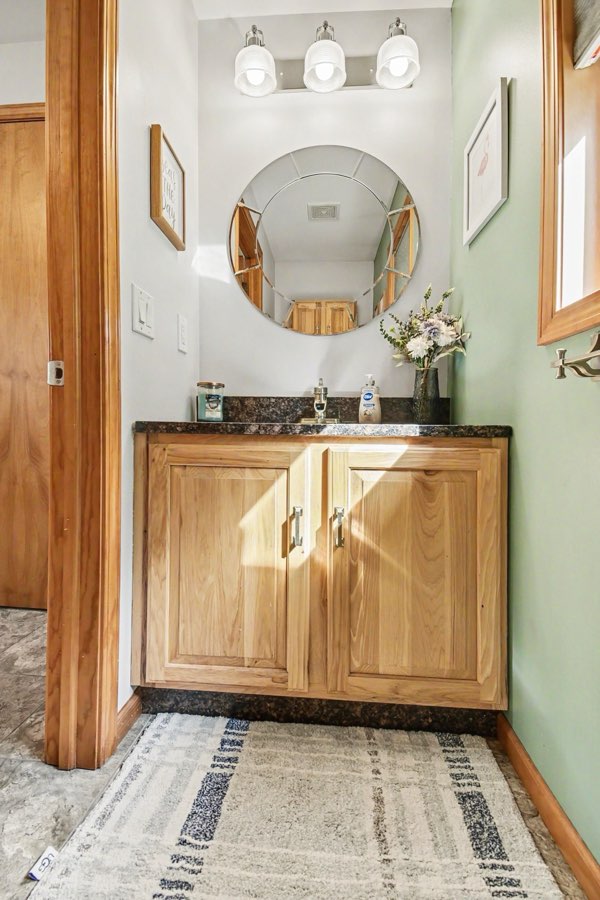 Portrait view of the main-floor half bathroom vanity